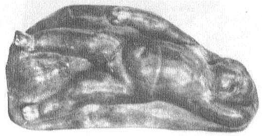 Putto, auf dem Rücken liegend