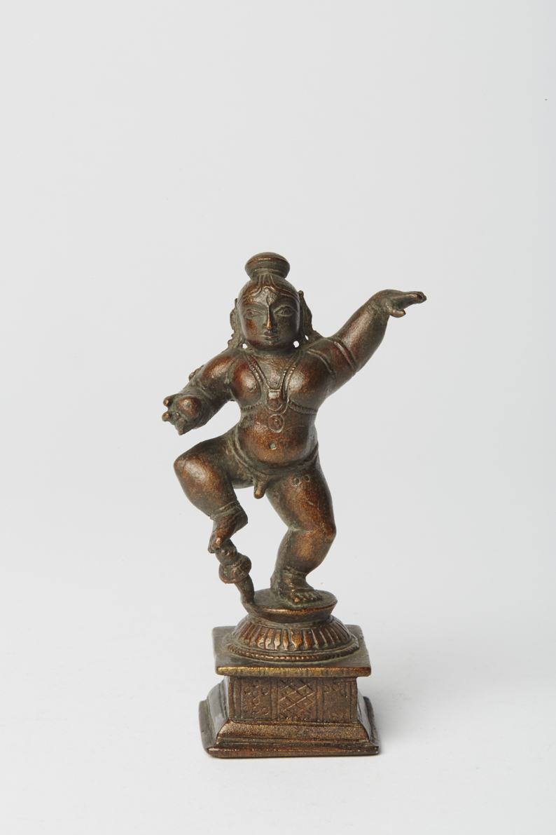 Dancing Krishna holding a Butter Ball