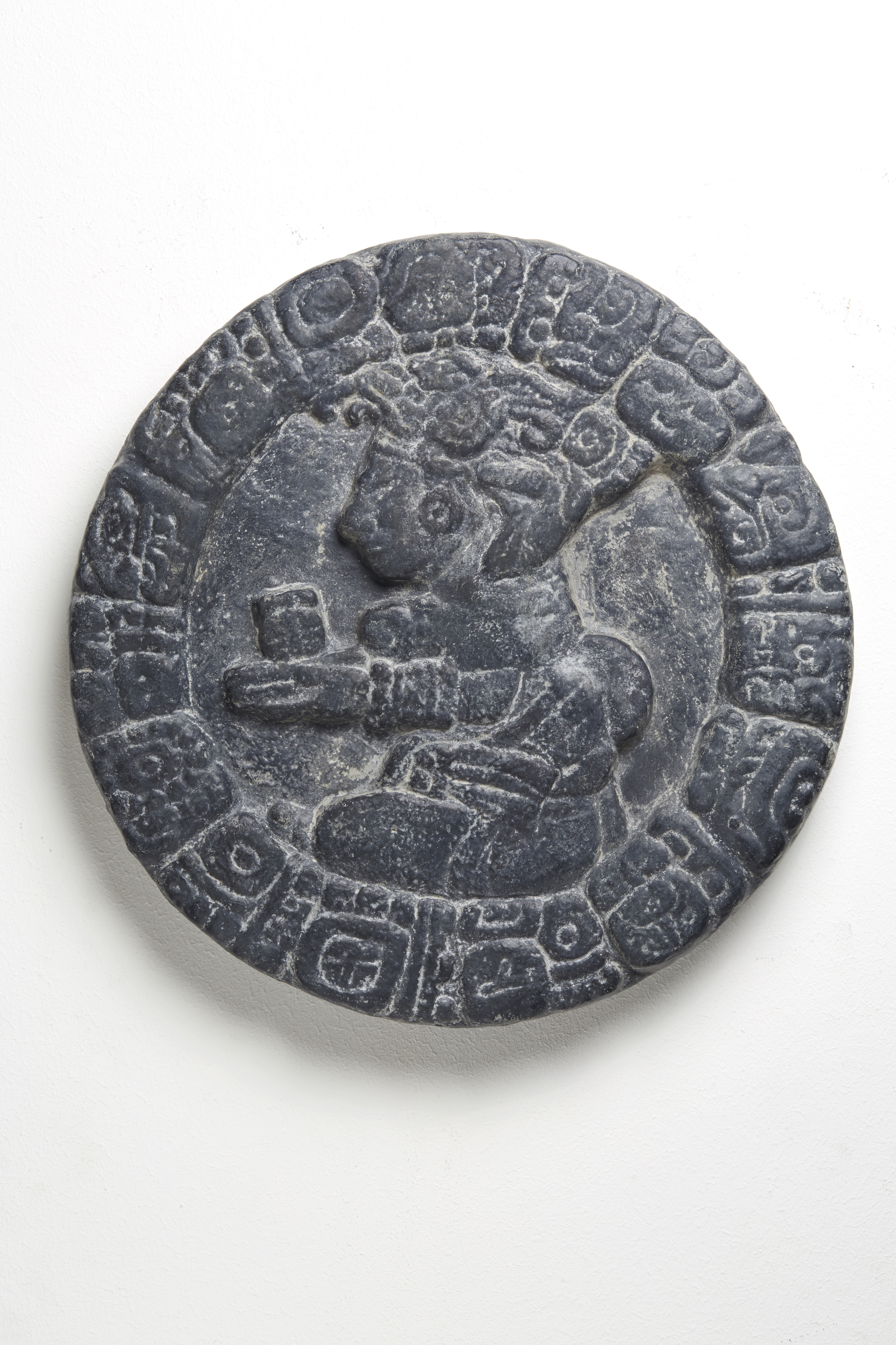 Disk Relief with Crouching Figure and Hieroglyph Circumscription